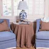 Trudie Constance Small Round Tablecloth with Ruffle on side table with two chairs