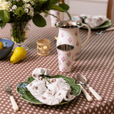 Trudie Pink Floral Tall Enamelware Tumblers - Set of 4 styled on a tabletop